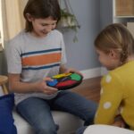 Hasbro Gaming Simon Handheld Electronic Memory Game With Lights and Sounds for Kids Ages 8 and Up - Image 8